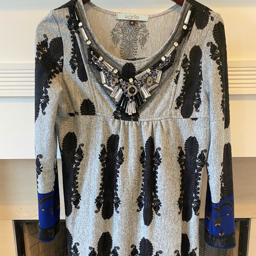 Sweater dress with embellishment